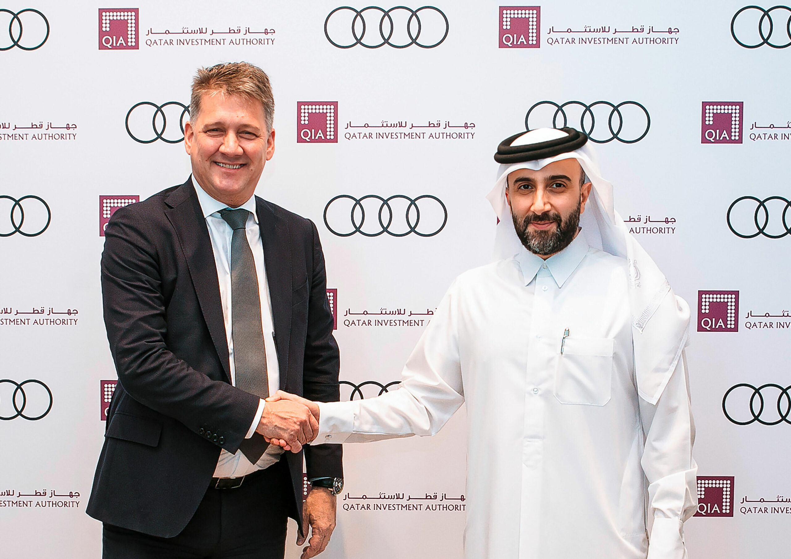 Dollner, CEO di AUDI AG e Al-Sowaidi, CEO di QIA. Audi vende quote del team F1 al fondo sovrano del Qatar (© Audi)