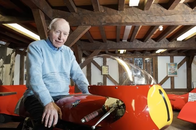 John Surtees con la sua MV Augusta con il numero 1 di campione del mondo